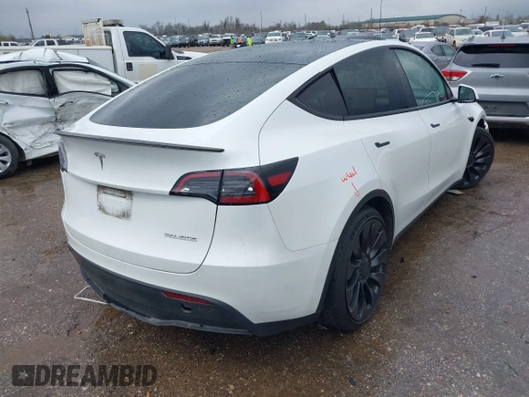 2023 Tesla Model Y Performance with VIN 7SAYGDEF7PF807312, listed as a IAAI auction lot 41711068 with 25,029 mi miles and . Bid and sale history available at DreamBid. Image 4.