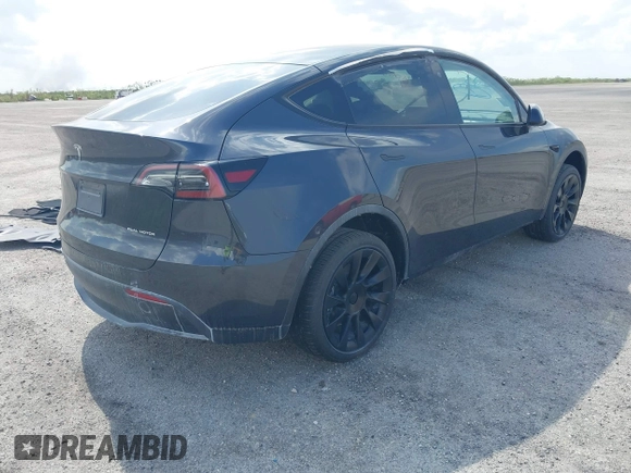 2024 Tesla Model Y Long Range z VIN 7SAYGAEE5RF074699, wystawiony jako IAAI lot #40537868 z przebiegiem Nie podano mil oraz . Historia ofert i sprzedaży dostępna na DreamBid. Obrazek 4.