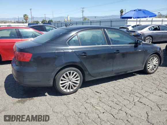 2012 Volkswagen Jetta SEL with VIN 3VWLP7AJ0CM327814, listed as a Copart auction lot 52235685 with 97,705 mi miles and Salvage title. Bid and sale history available at DreamBid. Image 3.