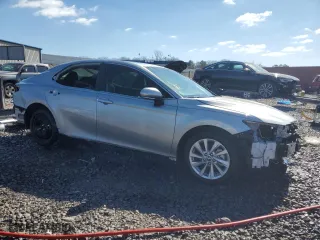 2024 Toyota Camry LE with VIN 4T1R11AK4RU263703, listed as a Copart auction lot 41975785 with 10,128 mi miles and Salvage Title. Bid and sale history available at carsss.com. Image 4.