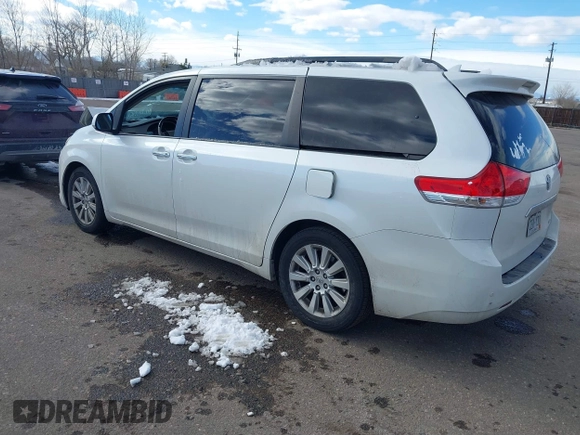 2011 Toyota Sienna XLE AAS with VIN 5TDYK3DC8BS045352, listed as a IAAI auction lot 41401955 with 142,492 mi miles and . Bid and sale history available at DreamBid. Image 3.