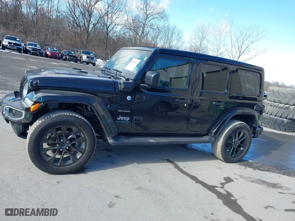 2023 Jeep Wrangler 4xe Sahara with VIN 1C4JJXP62PW613040, listed as a IAAI auction lot 41489171 with 36,818 mi miles. Bid and sale history available at carsss.com. Image 15.