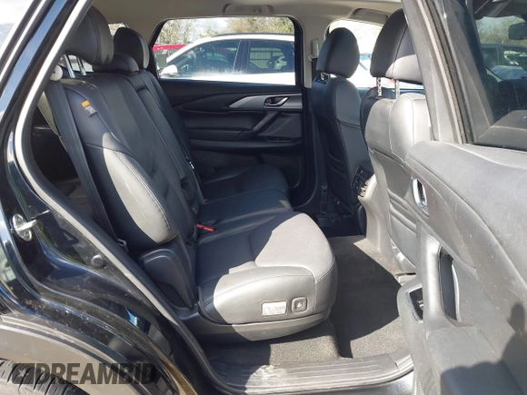 2023 Mazda CX-9 Touring Plus with VIN JM3TCBAY2P0657761, listed as a IAAI auction lot 41125586 with 12,425 mi miles and . Bid and sale history available at DreamBid. Image 8.