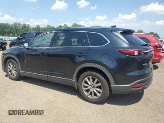 2019 Mazda CX-9 Touring with VIN JM3TCACY8K0301086, listed as a Copart auction lot 62193975 with 54,149 mi miles and Salvage title. Bid and sale history available at DreamBid. Image 2.