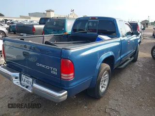 2003 Dodge Dakota SLT with VIN 1D7HL42N93S196397, listed as a IAAI auction lot 42105857 with 159,690 mi miles. Bid and sale history available at carsss.com. Image 4.