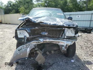 2001 Ford F-150 XLT z VIN 1FTRW08L21KB37421, wystawiony jako Copart lot #57114015 z przebiegiem 288 942 mil mil oraz Szkoda całkowita • Salvage title. Historia ofert i sprzedaży dostępna na DreamBid. Obrazek 5.