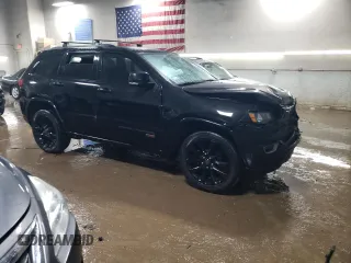 2017 Jeep Grand Cherokee Limited with VIN 1C4RJFBGXHC695261, listed as a Copart auction lot 47649375 with 97,153 mi miles and Salvage Title. Bid and sale history available at carsss.com. Image 4.