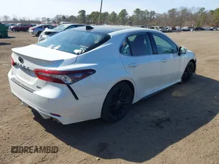 2022 Toyota Camry TRD with VIN 4T1KZ1AK9NU071181, listed as a IAAI auction lot 41758219 with 103,200 mi miles and . Bid and sale history available at DreamBid. Image 4.