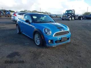 2013 MINI Coupe S with VIN WMWSX3C54DT466917, listed as a IAAI auction lot 41299885 with 98,726 mi miles and . Bid and sale history available at DreamBid. Image 1.