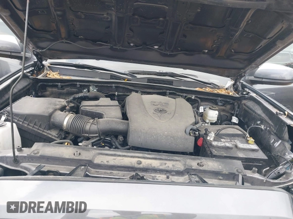 2023 Toyota Tacoma SR with VIN 3TYCZ5AN5PT138770, listed as a IAAI auction lot 41461423 with 19,785 mi miles and . Bid and sale history available at DreamBid. Image 10.