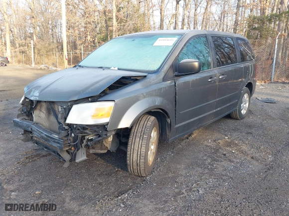 2010 Dodge Grand Caravan SE with VIN 2D4RN4DE7AR397092, listed as a IAAI auction lot 41084684 with 117,747 mi miles. Bid and sale history available at carsss.com. Image 2.