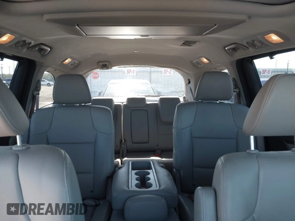 2016 Honda Odyssey Touring Elite with VIN 5FNRL5H98GB083221, listed as a IAAI auction lot 41626604 with 145,341 mi miles and . Bid and sale history available at DreamBid. Image 8.