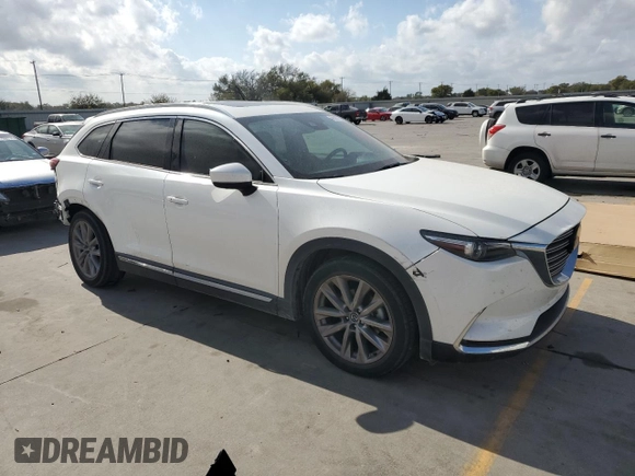 2021 Mazda CX-9 Grand Touring with VIN JM3TCADY2M0519977, listed as a Copart auction lot 76137724 with 31,306 mi miles and Salvage title. Bid and sale history available at DreamBid. Image 4.
