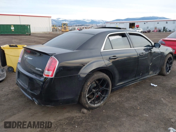 2013 Chrysler 300 SRT-8 with VIN 2C3CCAFJ8DH669813, listed as a IAAI auction lot 41360545 with 46,061 mi miles and . Bid and sale history available at DreamBid. Image 4.