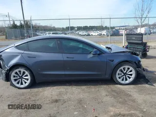 2022 Tesla Model 3 Long Range with VIN 5YJ3E1EB0NF314870, listed as a IAAI auction lot 41762301 with 38,840 mi miles and . Bid and sale history available at DreamBid. Image 13.