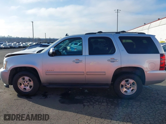 2014 Chevrolet Tahoe LT z VIN 1GNSKBE04ER197644, wystawiony jako IAAI lot #41322255 z przebiegiem 127 142 mil mil oraz . Historia ofert i sprzedaży dostępna na DreamBid. Obrazek 14.