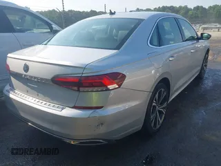 2021 Volkswagen Passat SE with VIN 1VWSA7A38MC012907, listed as a IAAI auction lot 42581889 with 76,001 mi miles and . Bid and sale history available at DreamBid. Image 4.