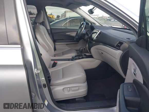 2016 Honda Pilot EX-L with VIN 5FNYF5H57GB038349, listed as a IAAI auction lot 41378569 with 117,651 mi miles and . Bid and sale history available at DreamBid. Image 5.