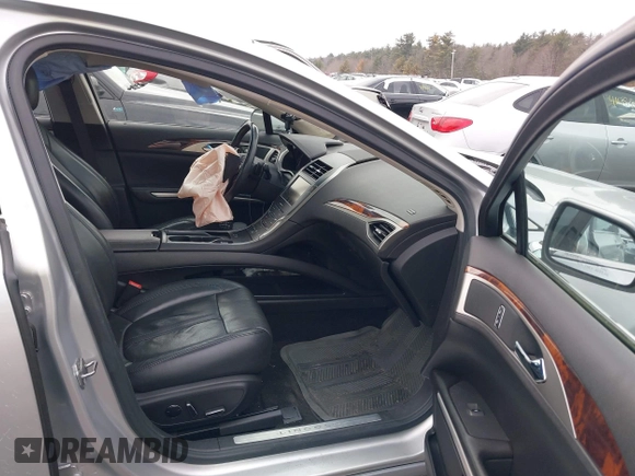 2013 Lincoln MKZ with VIN 3LN6L2J96DR800877, listed as a IAAI auction lot 41256557 with 125,584 mi miles. Bid and sale history available at carsss.com. Image 5.