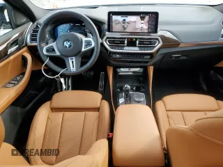 2024 BMW X4 M40i with VIN 5UX43DT00R9T40316, listed as a Copart auction lot 46582885 with 9,335 mi miles and Salvage Title. Bid and sale history available at carsss.com. Image 8.