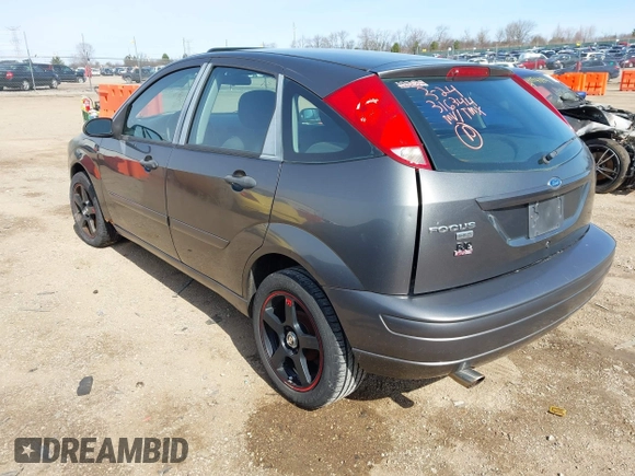 2007 Ford Focus S z VIN 1FAHP37N17W316344, wystawiony jako IAAI lot #41882805 z przebiegiem 262 422 mil mil oraz . Historia ofert i sprzedaży dostępna na DreamBid. Obrazek 3.