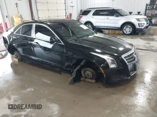 2014 Cadillac ATS Luxury RWD z VIN 1G6AB5RX4E0182548, wystawiony jako IAAI lot #42176540 z przebiegiem 98 079 mil mil oraz . Historia ofert i sprzedaży dostępna na DreamBid. Obrazek 1.