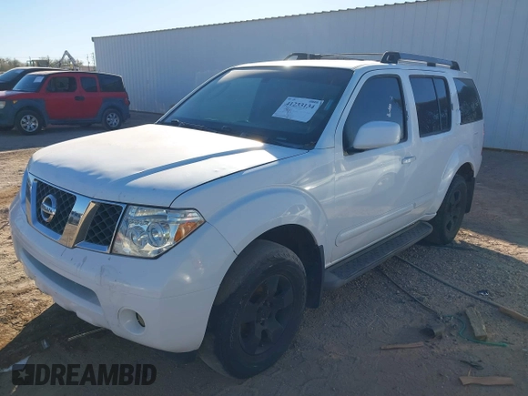 2005 Nissan Pathfinder SE with VIN 5N1AR18W75C711706, listed as a IAAI auction lot 41233134 with 182,952 mi miles and . Bid and sale history available at DreamBid. Image 2.