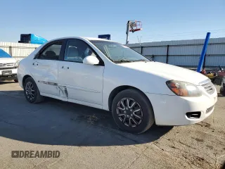 2009 Kia Spectra SX with VIN KNAFE222095644617, listed as a Copart auction lot 78531514 with 240,465 mi miles and Salvage Title. Bid and sale history available at carsss.com. Image 4.