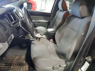2014 Toyota Tacoma with VIN 3TMLU4EN3EM151500, listed as a Copart auction lot 57147705 with 170,240 mi miles and Salvage title. Bid and sale history available at DreamBid. Image 7.