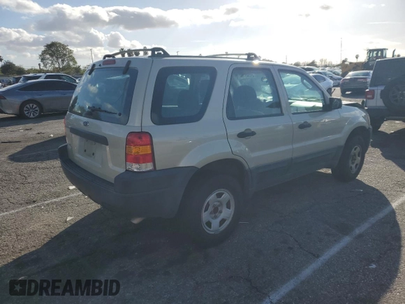 2004 Ford Escape XLS with VIN 1FMYU021X4KA41111, listed as a Copart auction lot 45393765 with 125,492 mi miles and Salvage Title. Bid and sale history available at DreamBid. Image 3.