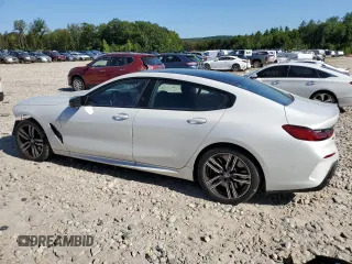 2023 BMW 8 Series M850i with VIN WBAGV8C01PCM79724, listed as a Copart auction lot 69486194 with 14,285 mi miles and Salvage title. Bid and sale history available at DreamBid. Image 2.