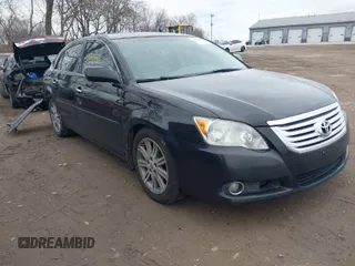 2009 Toyota Avalon XL with VIN 4T1BK36B09U336228, listed as a IAAI auction lot 41070880 with 137,495 mi miles. Bid and sale history available at carsss.com. Image 1.