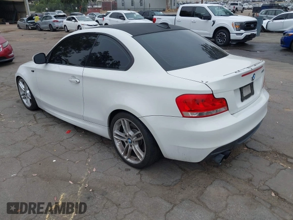 2013 BMW 1 Series 135i with VIN WBAUC9C54DVY60154, listed as a IAAI auction lot 42354743 with 159,571 mi miles and . Bid and sale history available at DreamBid. Image 3.
