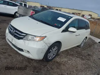 2017 Honda Odyssey EX-L with VIN 5FNRL5H62HB014449, listed as a IAAI auction lot 41736940 with 205,144 mi miles and . Bid and sale history available at DreamBid. Image 2.