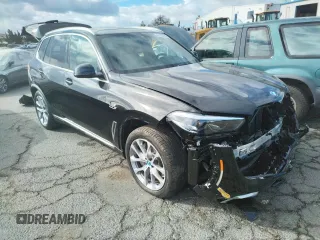 2022 BMW X5 xDrive45e with VIN 5UXTA6C01N9M84108, listed as a Copart auction lot 65150782 with 5,977 mi miles. Bid and sale history available at carsss.com. Image 1.