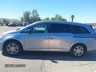 2012 Honda Odyssey EX-L with VIN 5FNRL5H69CB003067, listed as a IAAI auction lot 41862591 with 163,158 mi miles and . Bid and sale history available at carsss.com. Image 14.