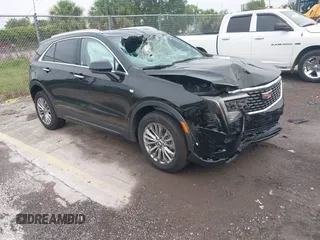 2024 Cadillac XT4 AWD Premium Luxury with VIN 1GYFZDR44RF147956, listed as a IAAI auction lot 42434595 with 26,328 mi miles and . Bid and sale history available at DreamBid. Image 1.