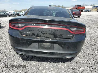 2018 Dodge Charger SXT Plus with VIN 2C3CDXHG2JH329120, listed as a Copart auction lot 49746455 with 106,182 mi miles and Salvage Title. Bid and sale history available at carsss.com. Image 6.