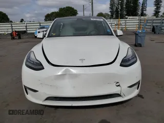 2020 Tesla Model Y Long Range z VIN 5YJYGDEE2LF049815, wystawiony jako Copart lot #53738165 z przebiegiem 113 779 mil mil oraz Szkoda całkowita • Salvage title. Historia ofert i sprzedaży dostępna na DreamBid. Obrazek 5.