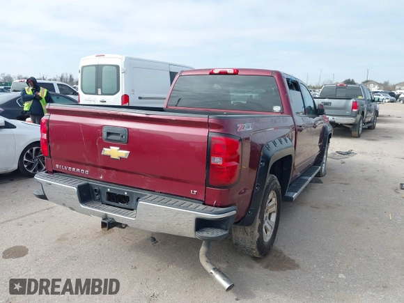 2015 Chevrolet Silverado 1500 LT with VIN 3GCUKREC0FG261927, listed as a IAAI auction lot 41598096 with Not Provided miles and . Bid and sale history available at DreamBid. Image 4.