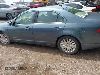 2011 Ford Fusion Hybrid with VIN 3FADP0L37BR302056, listed as a IAAI auction lot 42680595 with 276,846 mi miles and . Bid and sale history available at DreamBid. Image 14.