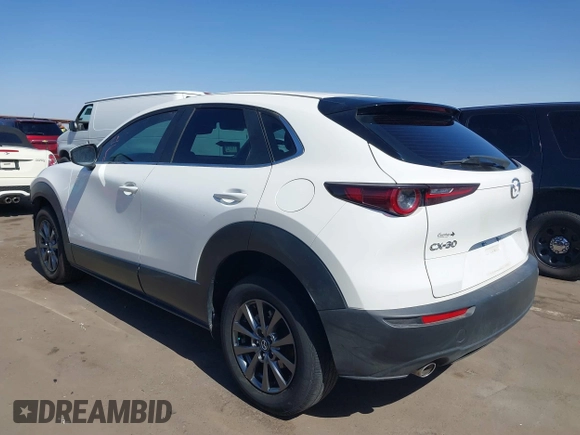 2021 Mazda CX-30 S with VIN 3MVDMAAL5MM303944, listed as a IAAI auction lot 41687532 with 35,379 mi miles and . Bid and sale history available at DreamBid. Image 3.