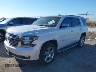 2016 Chevrolet Tahoe LTZ with VIN 1GNSKCKC0GR203348, listed as a IAAI auction lot 42220438 with 108,657 mi miles and . Bid and sale history available at DreamBid. Image 2.