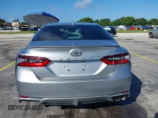 2023 Toyota Camry SE z VIN 4T1G11AK9PU805365, wystawiony jako IAAI lot #40647197 z przebiegiem 18 643 mil mil oraz . Historia ofert i sprzedaży dostępna na DreamBid. Obrazek 17.
