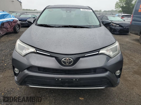 2018 Toyota RAV4 XLE with VIN 2T3WFREV0JW445322, listed as a Copart auction lot 55623845 with 116,700 mi miles and Salvage title. Bid and sale history available at DreamBid. Image 5.