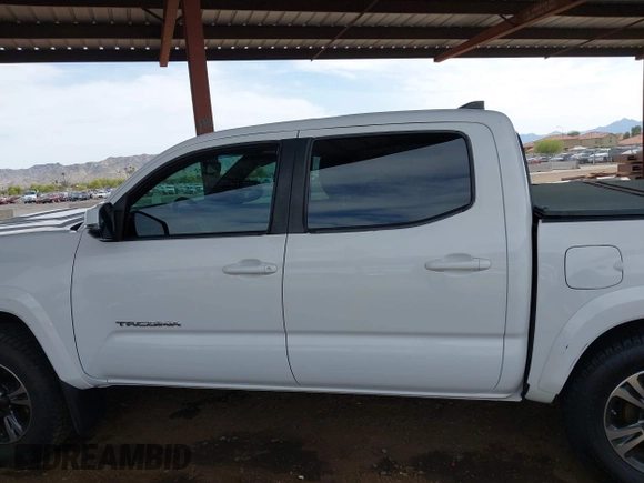 2017 Toyota Tacoma SR5 with VIN 3TMAZ5CN0HM042269, listed as a IAAI auction lot 41928544 with 89,942 mi miles and . Bid and sale history available at carsss.com. Image 13.