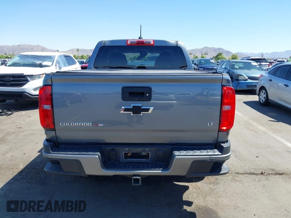 2020 Chevrolet Colorado 2WD LT with VIN 1GCGSCEN7L1103428, listed as a IAAI auction lot 42574728 with 73,313 mi miles and . Bid and sale history available at DreamBid. Image 16.