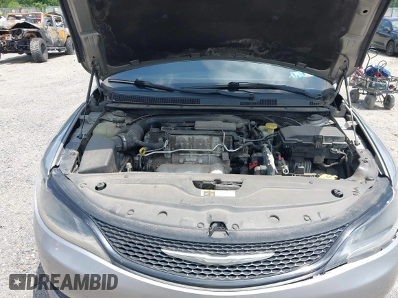 2015 Chrysler 200 S with VIN 1C3CCCBB8FN565732, listed as a IAAI auction lot 42754941 with 114,731 mi miles and . Bid and sale history available at DreamBid. Image 10.