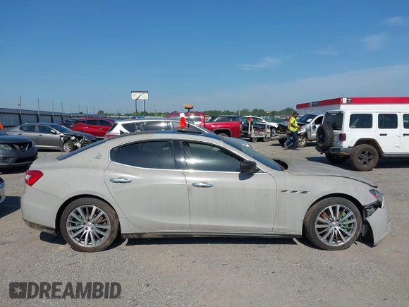 2015 Maserati Ghibli S Q4 with VIN ZAM57RTA7F1138207, listed as a IAAI auction lot 42573567 with Not provided miles and . Bid and sale history available at DreamBid. Image 13.