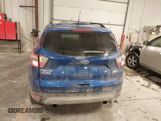 2017 Ford Escape SE z VIN 1FMCU9GD2HUB99955, wystawiony jako IAAI lot #41572200 z przebiegiem 63 023 mil mil oraz . Historia ofert i sprzedaży dostępna na DreamBid. Obrazek 16.